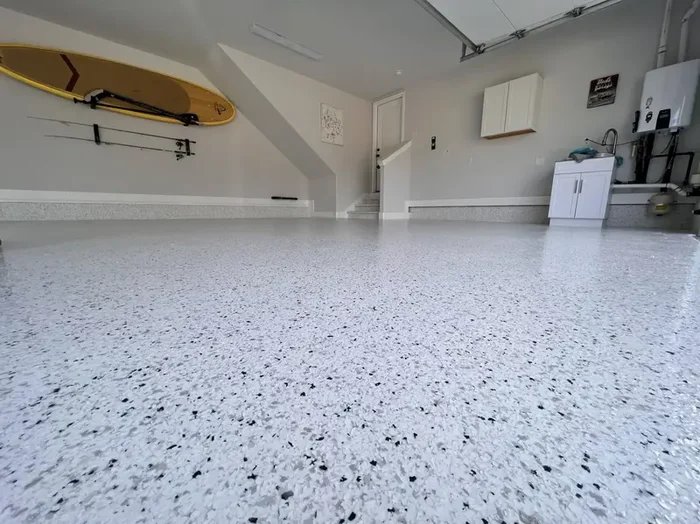 Light flake epoxy garage floor with a satin finish